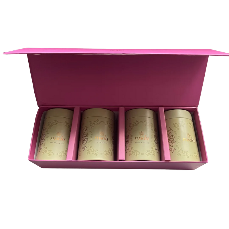 Rashmika Dry Fruit Gift Box – Open Tin: Premium Rashmika tin opened to reveal a colorful assortment of nuts and dry fruits, presented in a luxury gift box.