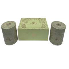 Two cylindrical green containers with a matching box featuring Rasika Dry fruits Gift Box with Tins Rasda branding on a white background.