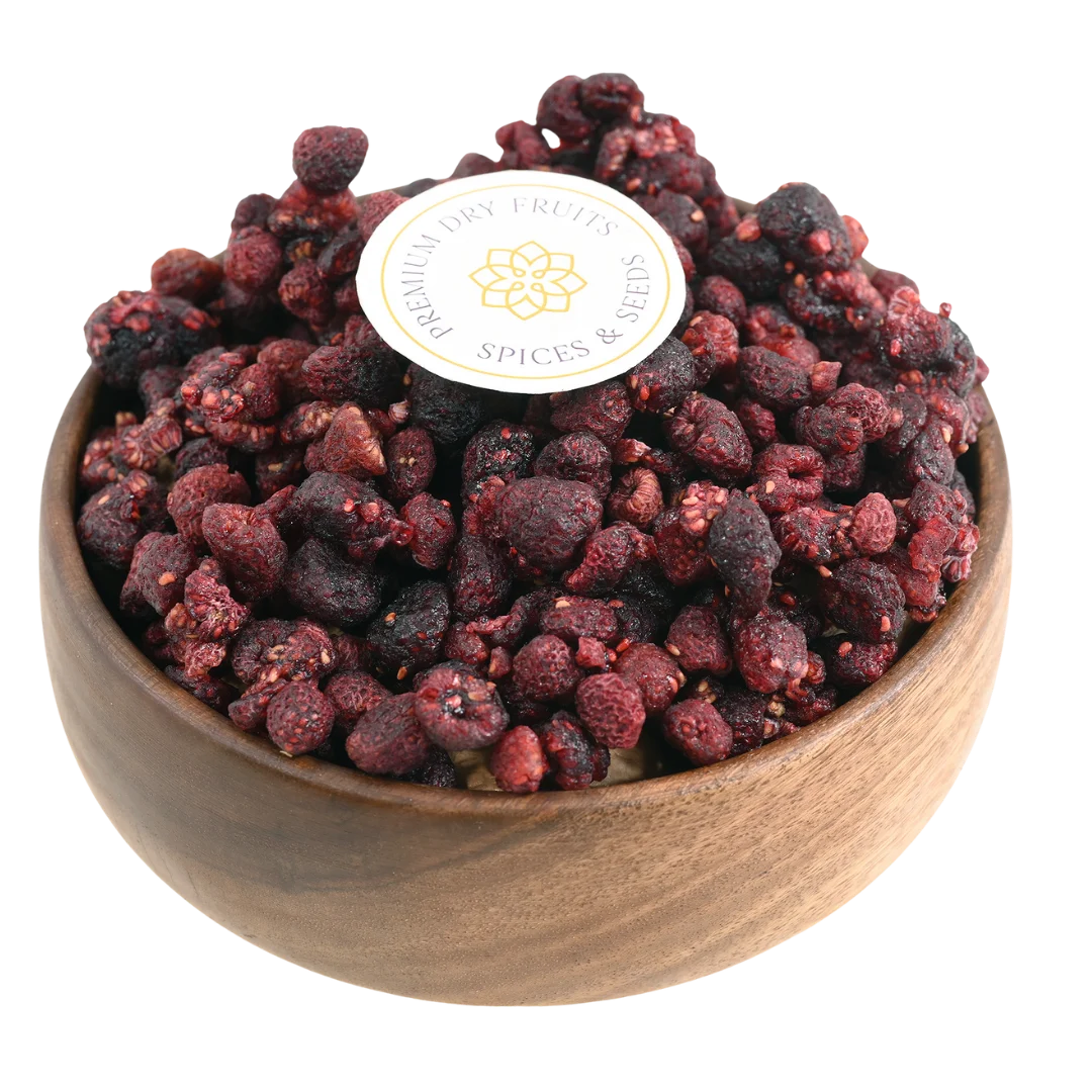 Premium raspberries dried in a wooden bowl, showcasing their deep red color and natural texture.