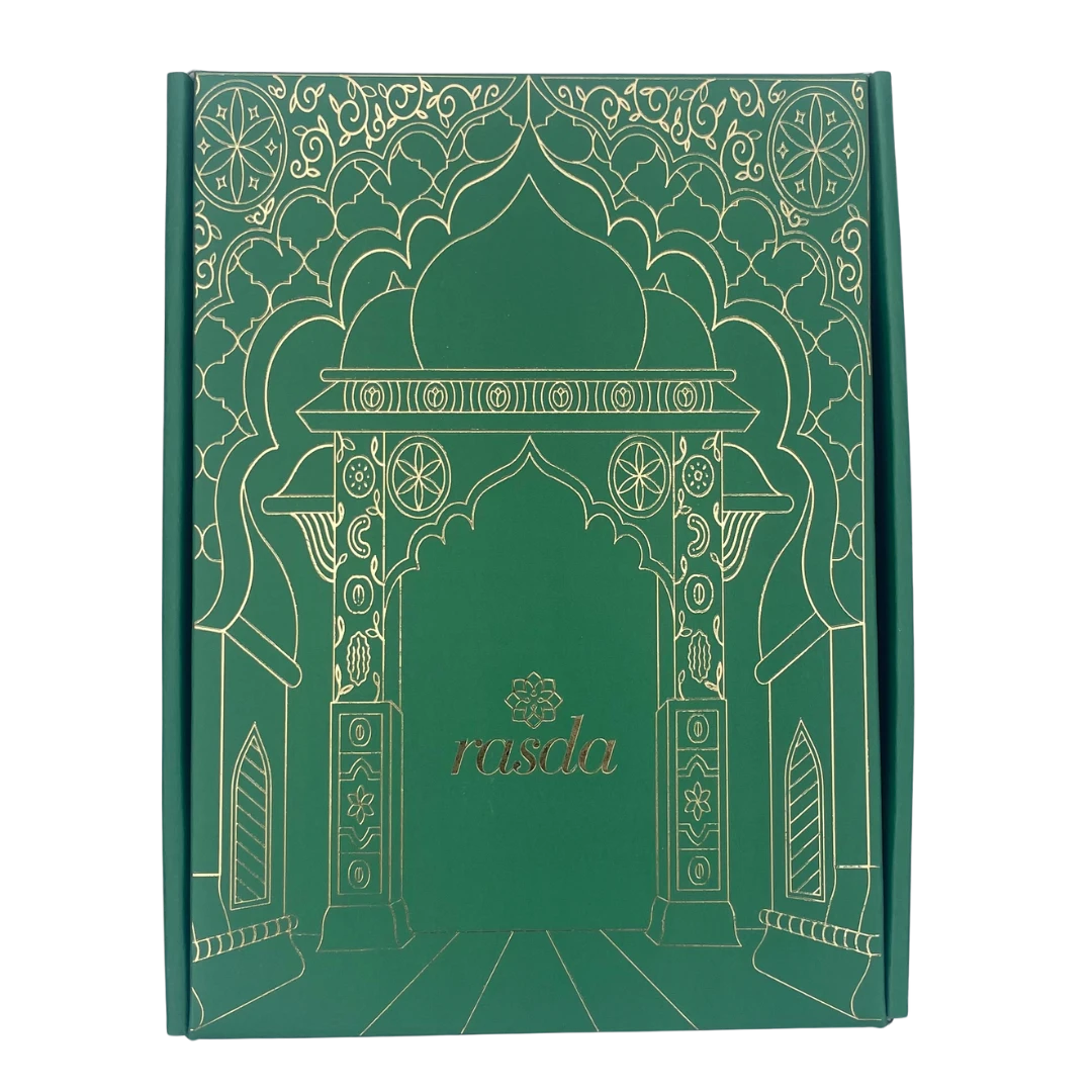 Luxurious Ridhima gift box featuring elegant designer tins filled with premium dry fruits
