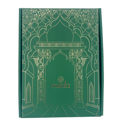 Luxurious Ridhima gift box featuring elegant designer tins filled with premium dry fruits