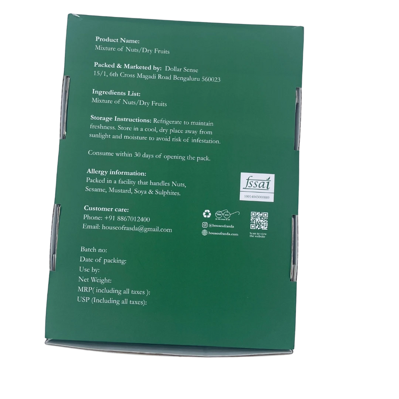 Beautifully presented Ridhima dry fruit gift box with open tins showcasing assorted nuts and dry fruits in vibrant, reusable containers.