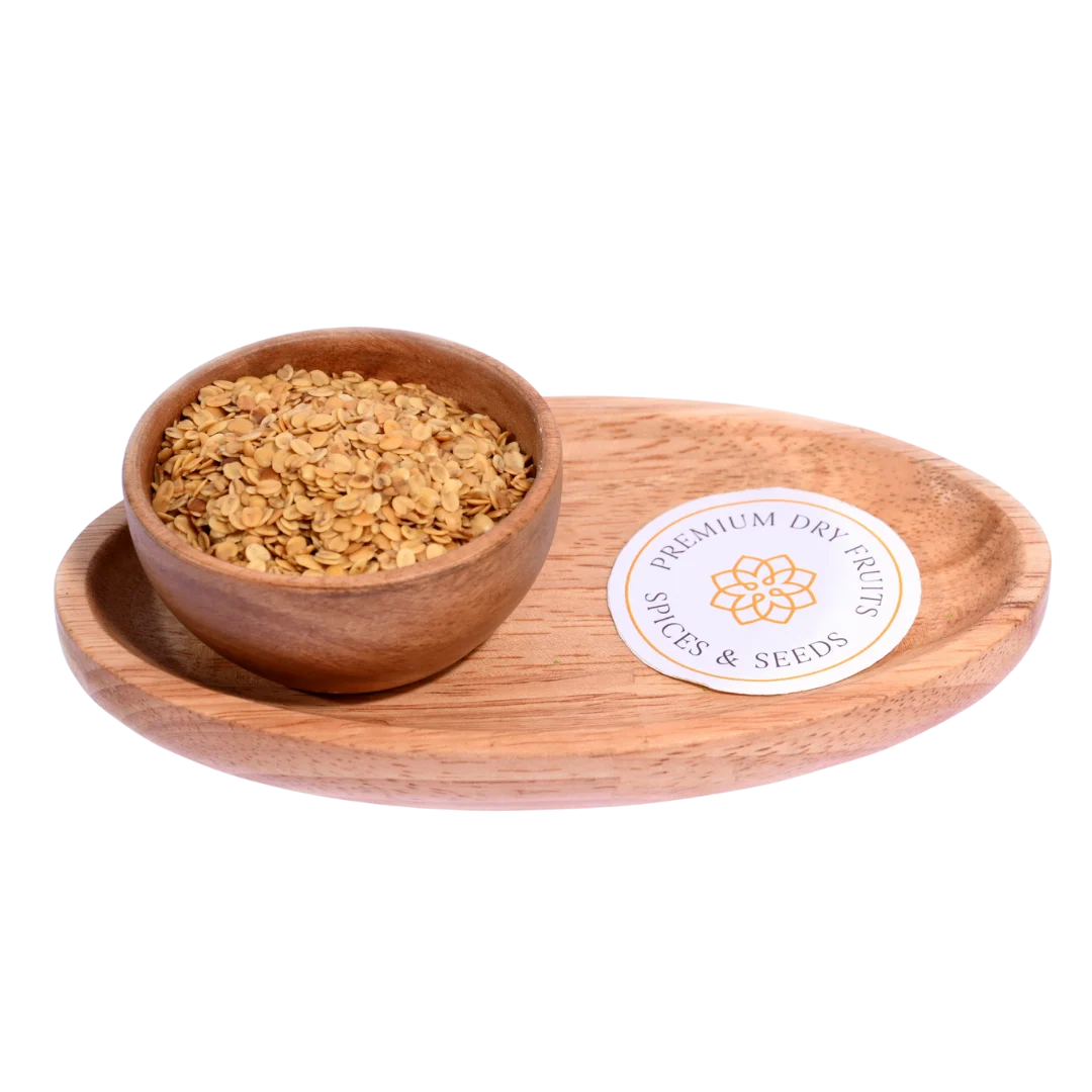 Roasted Coriander Seeds or Dhana Dal in a wooden bowl crisp, aromatic, and perfect as a digestive mouth freshener.