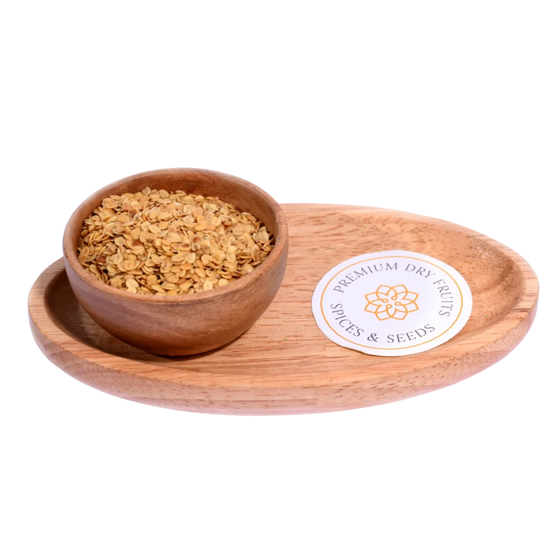 Roasted Coriander Seeds or Dhana Dal in a wooden bowl crisp, aromatic, and perfect as a digestive mouth freshener.