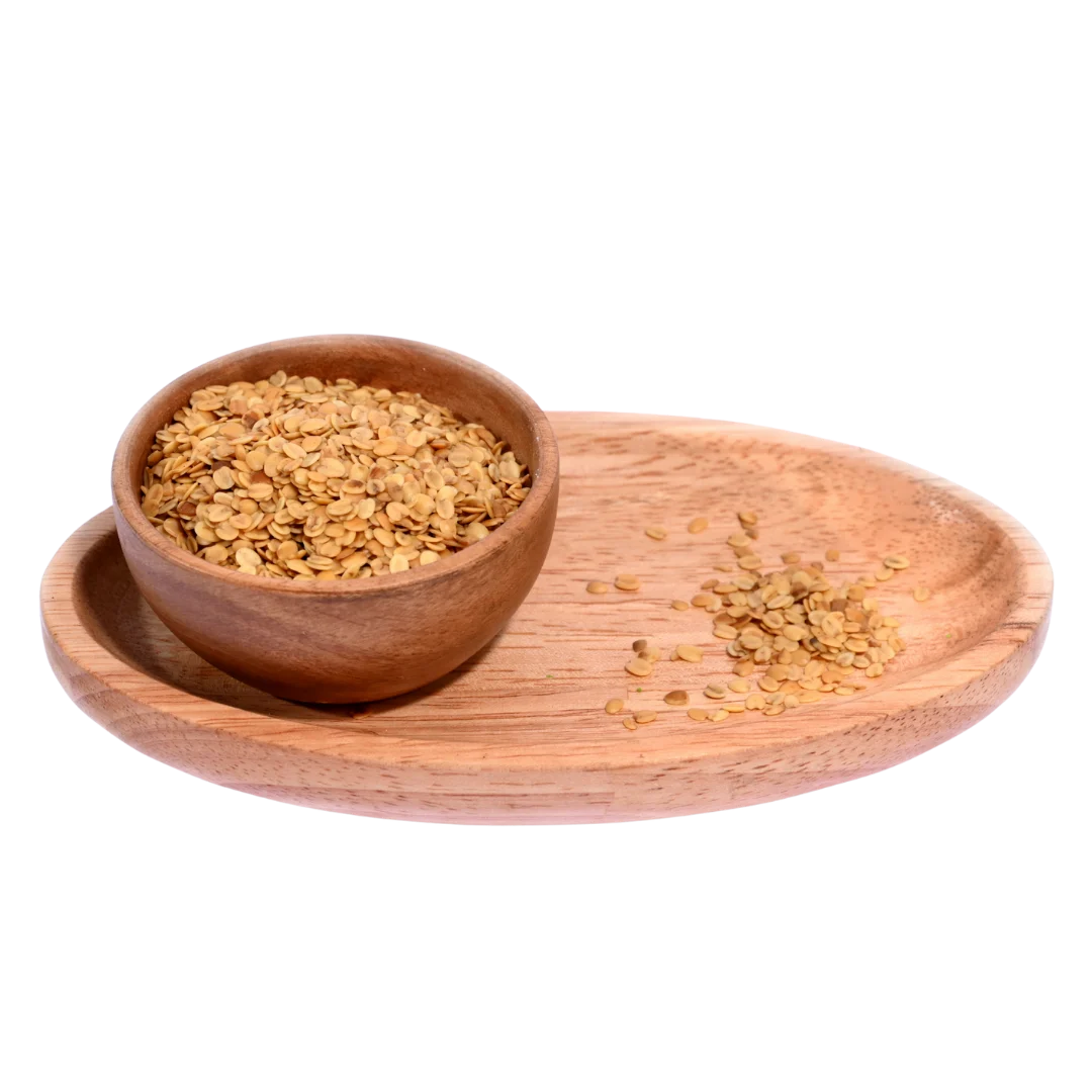 Crunchy Roasted Coriander Seeds or Dhana Dal in a wooden bowl, ideal for post-meal munching or spice blends.