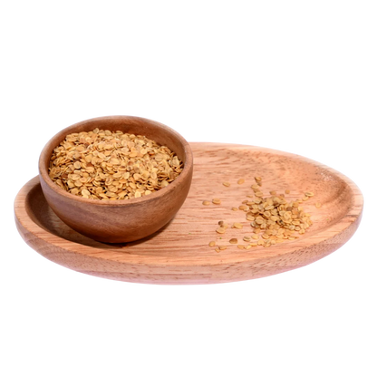 Crunchy Roasted Coriander Seeds or Dhana Dal in a wooden bowl, ideal for post-meal munching or spice blends.