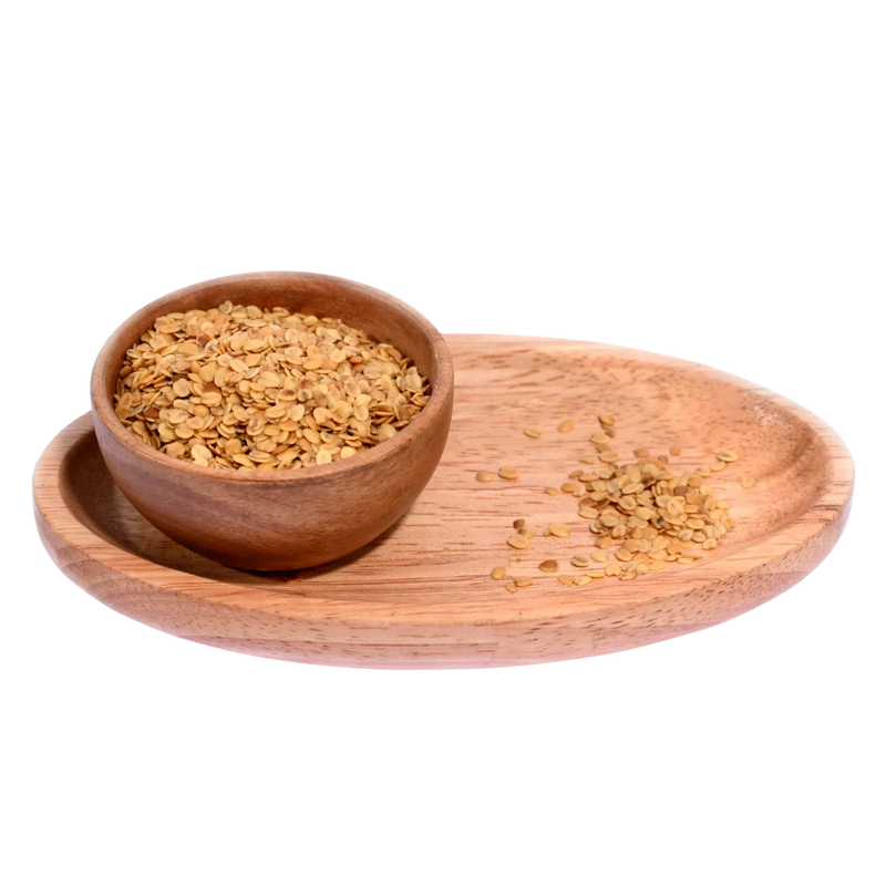 Crunchy Roasted Coriander Seeds or Dhana Dal in a wooden bowl, ideal for post-meal munching or spice blends.