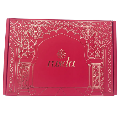 Red box with intricate patterns and 'rasda' branding - Rudira Dry fruits Gift Box Premium with Tins inside.