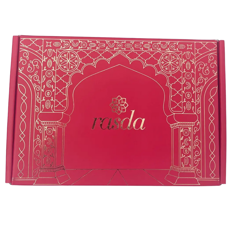 Red box with intricate patterns and 'rasda' branding - Rudira Dry fruits Gift Box Premium with Tins inside.