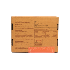 Natural Safawi dates shown in the cup along with the Packaging Box.