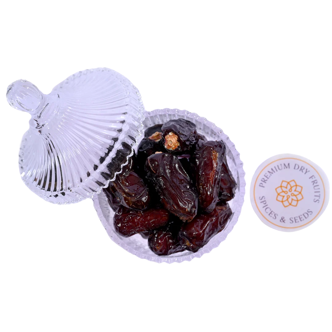 Premium Saudi Safawi Dates served in glass bowl fresh nutritious dry fruits healthy snack