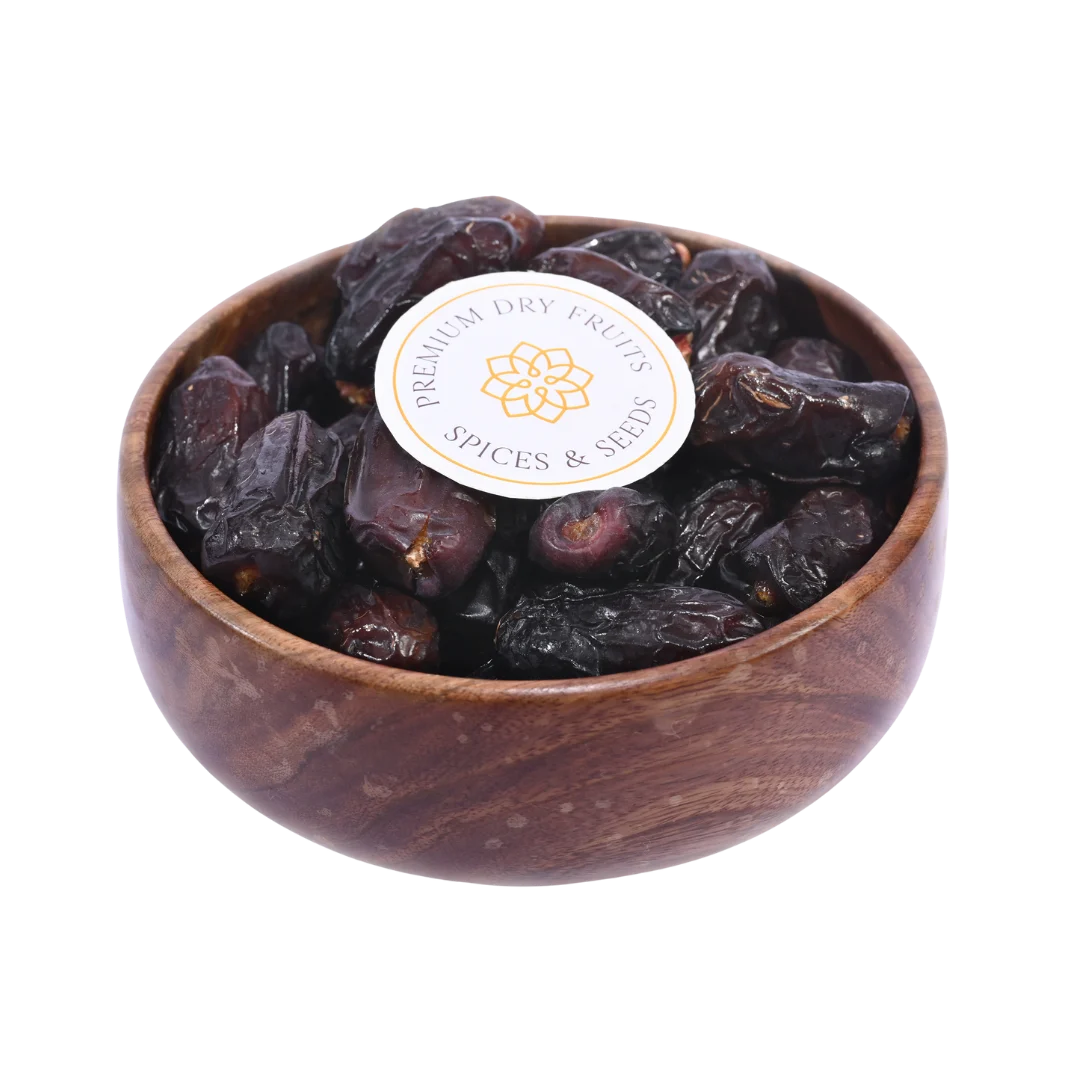 Safawi Dates Saudi Arabia Select in wooden bowl soft dark dates rich in fiber and natural energy