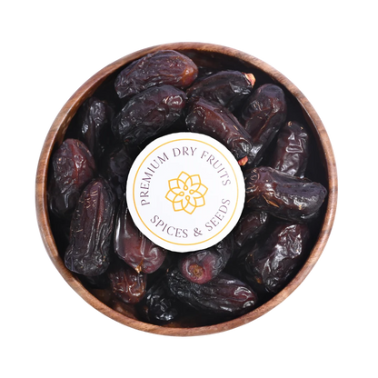 Select Safawi Dates from Saudi Arabia in wooden bowl premium quality healthy natural dry fruits