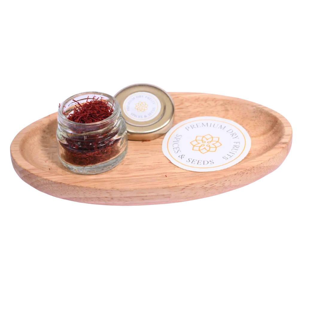 Jar of saffron on a wooden tray with a visible brand label on a white background