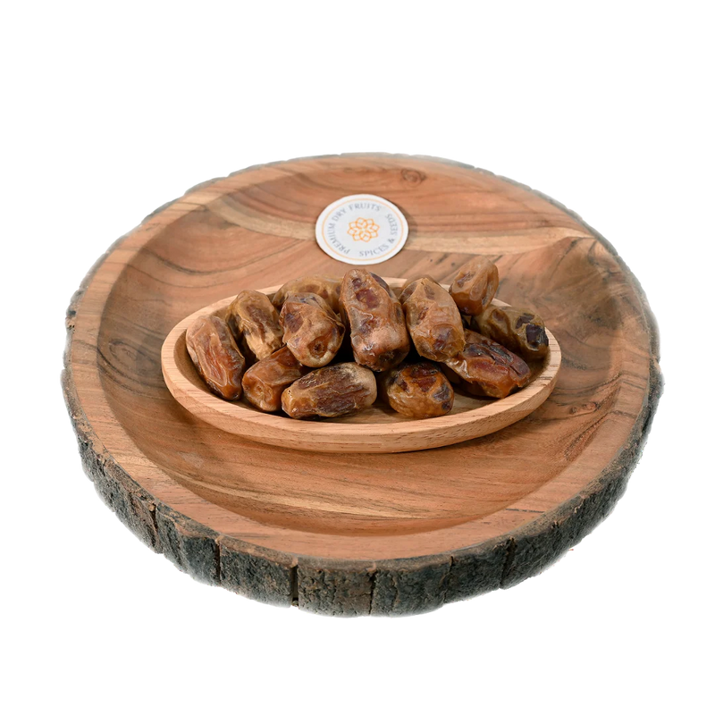 Sagai Dates Saudi Arabia Premium in wooden bowl – soft, sweet, and golden Arabian dates