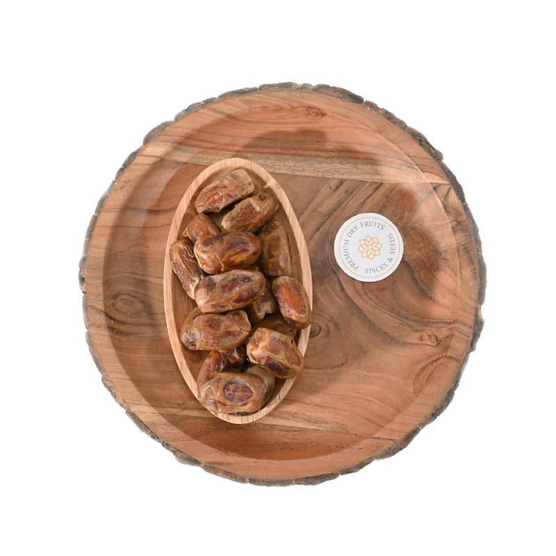 Sagai dates are typically medium-sized, oblong-shaped, and have a dark brown skin with a light-colored flesh inside.