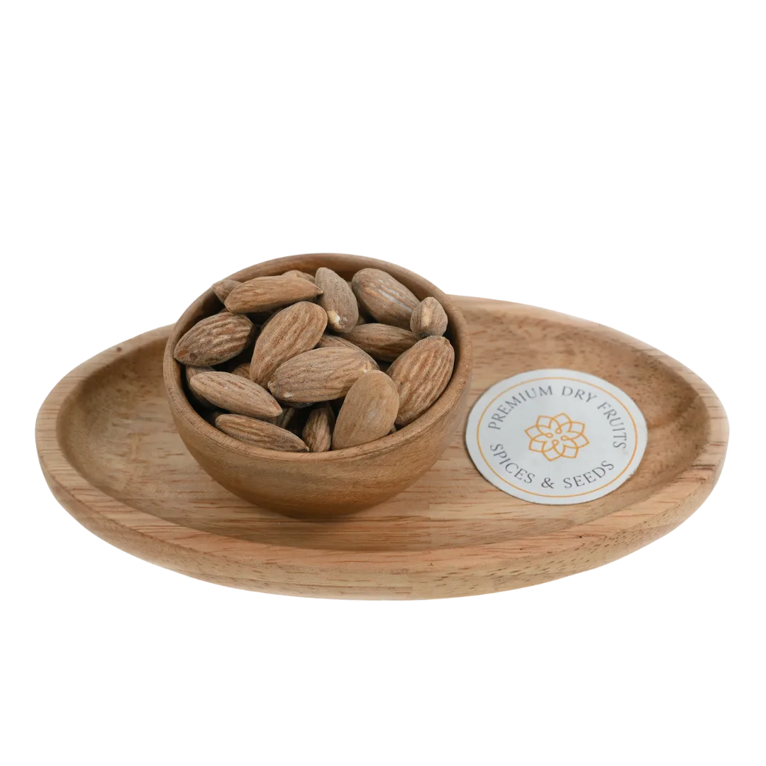 Salted Almonds Badam in wooden bowl – roasted crunchy almonds lightly salted for tasty healthy snacking and protein boost