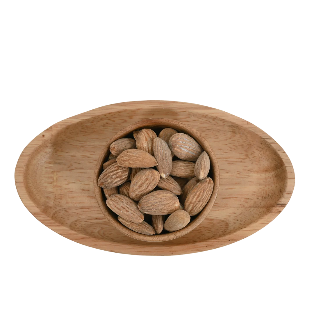 Salted Almonds Badam on rustic surface – savory roasted nuts packed with protein and antioxidants for energy and wellness