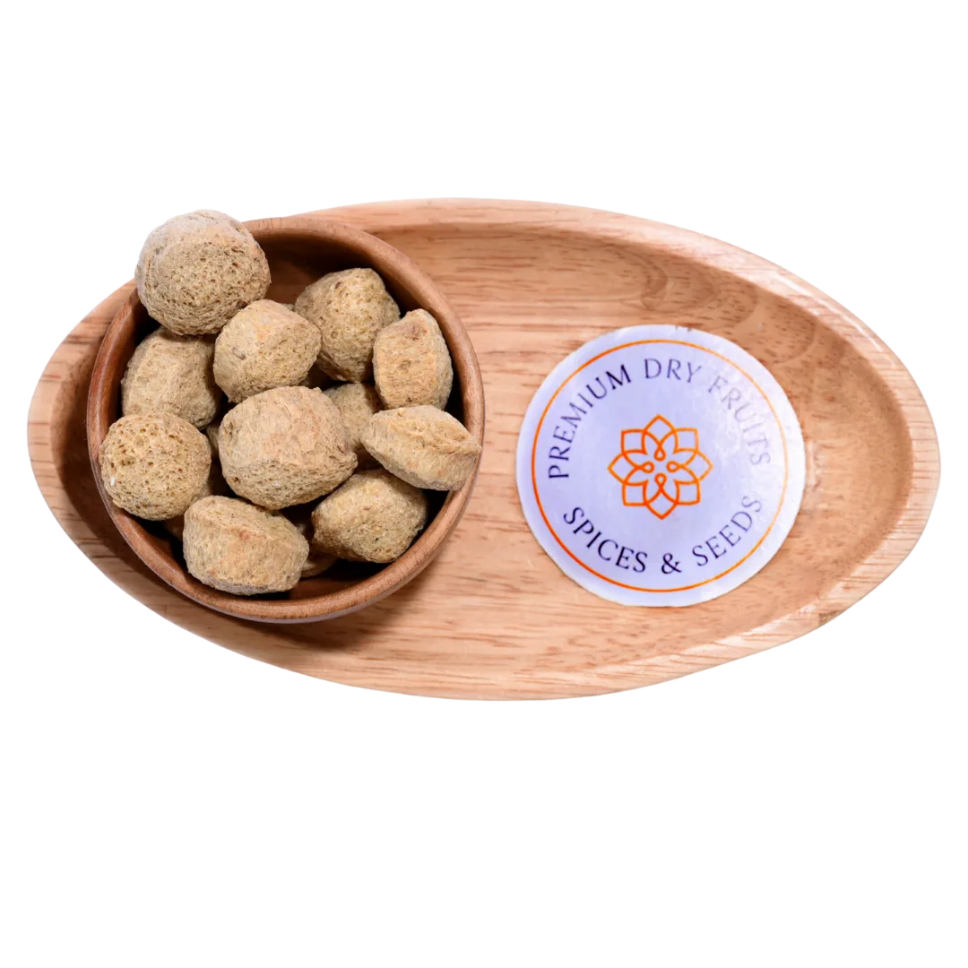 Close-up of Soya Chunks, highlighting their dry, porous surface and natural beige color.