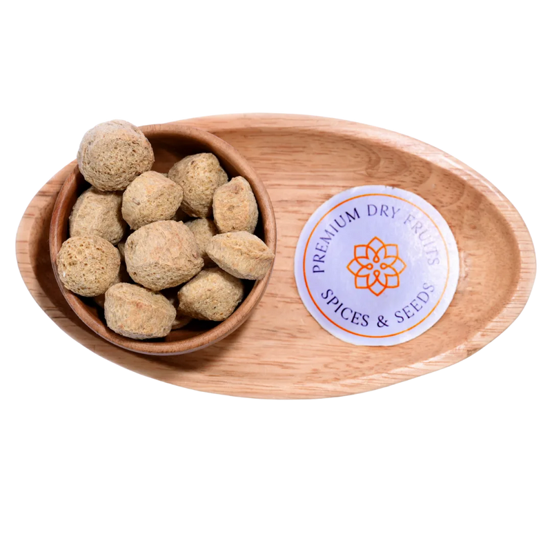 Close-up of Soya Chunks, highlighting their dry, porous surface and natural beige color.