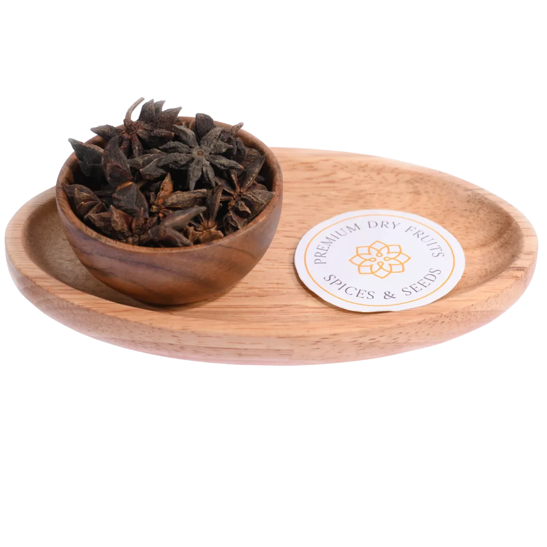 Star Anise or Chakra Phool in a wooden bowl showcases beautifully shaped aromatic spice pods.