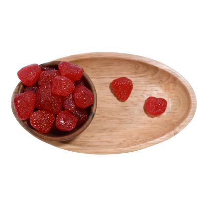 Wooden bowl and tray with red Strawberries Dried Whole Premium on a white background.