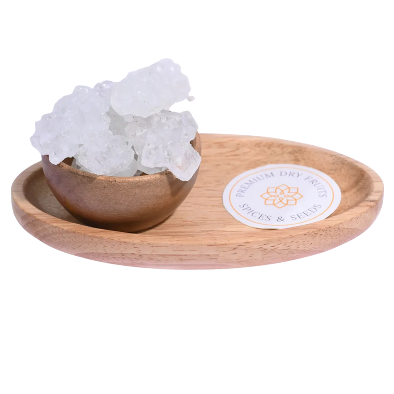 Thread Crystal / Dhaaga Mishri in a wooden bowl showcases long, translucent sugar crystals.