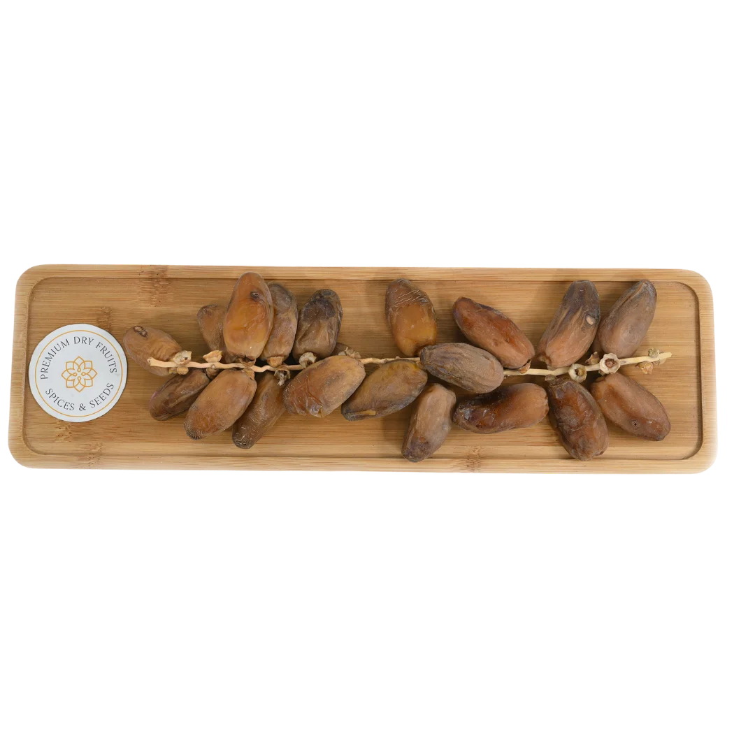Premium Deglet Noor Dates Tunisia with branches on wooden tray – natural sweet dry fruit