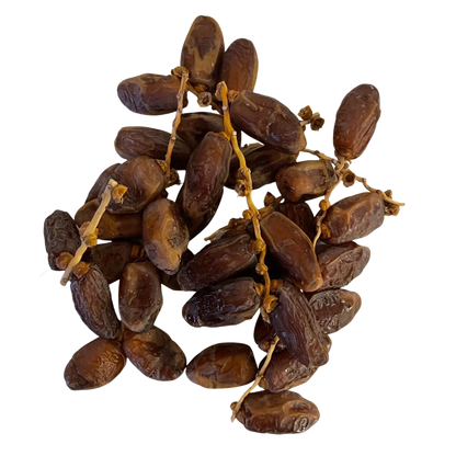 Deglet Noor Dates with branches Tunisia Premium quality on wooden tray – rich, chewy dates
