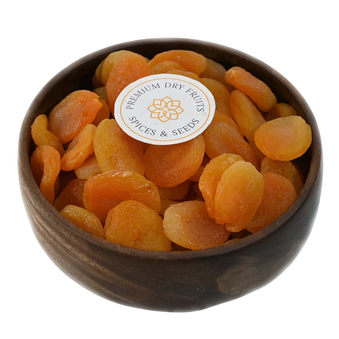 Turkish Dried Apricots Seedless Premium in wooden bowl – soft golden orange apricots rich in vitamins fiber and antioxidants for healthy snacking
