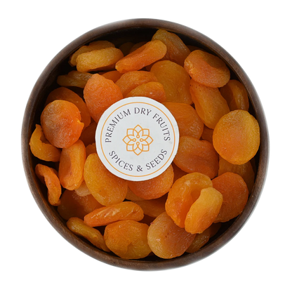 Turkish Dried Apricots Seedless Premium Turkish Dried Apricots Seedless close up – naturally sweet and chewy dry fruits full of nutrients perfect for energy and glowing skin