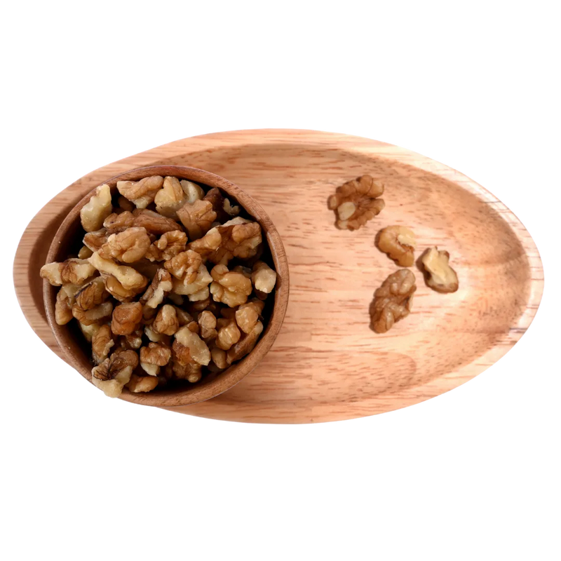 Premium walnut Kashmiri pieces akhrot in wooden bowl healthy and crunchy snack