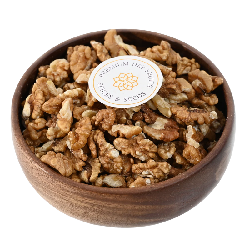 Premium Kashmiri walnut quarters in wooden bowl, Akhrot healthy nuts