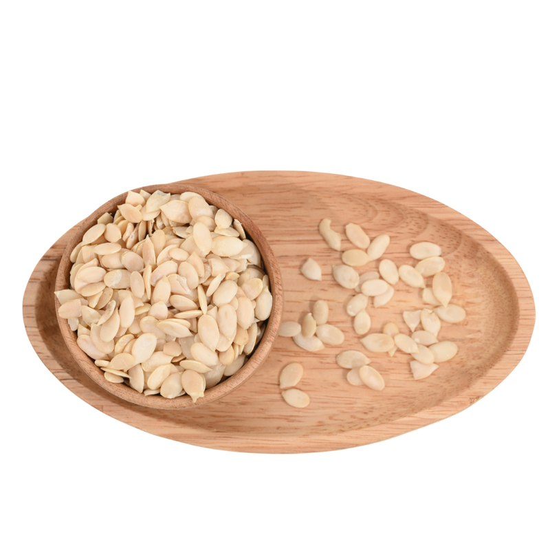 Organic watermelon seeds displayed in a handcrafted wooden bowl, ideal for healthy eating.