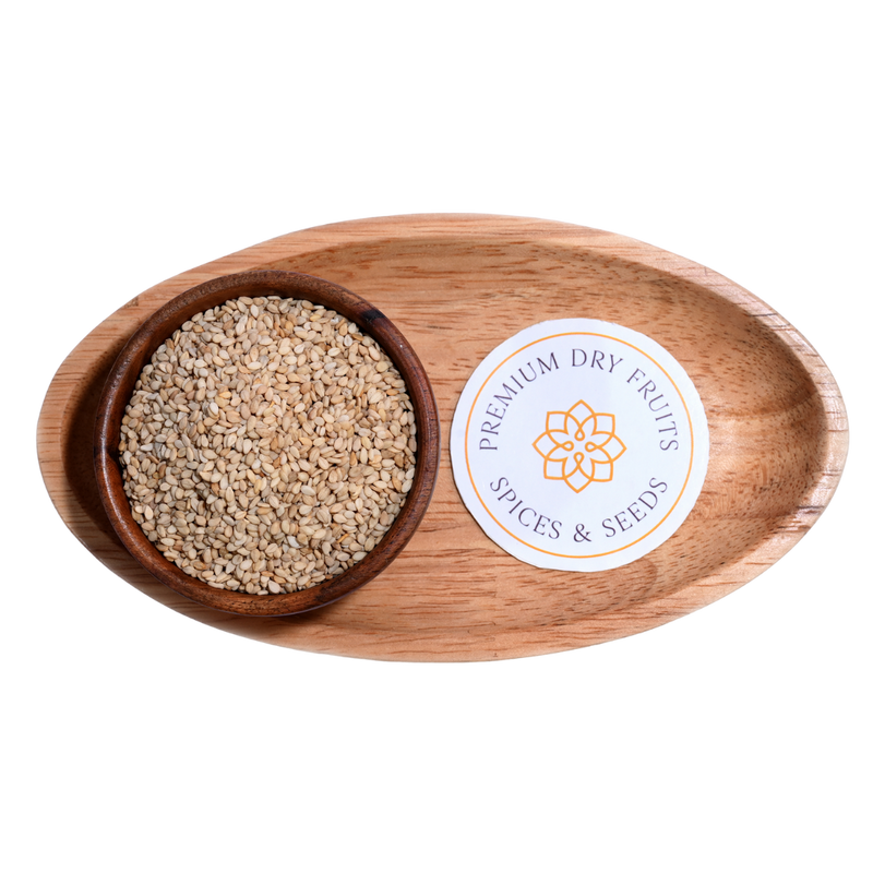 White sesame seeds in wooden Bowl Premium Quality