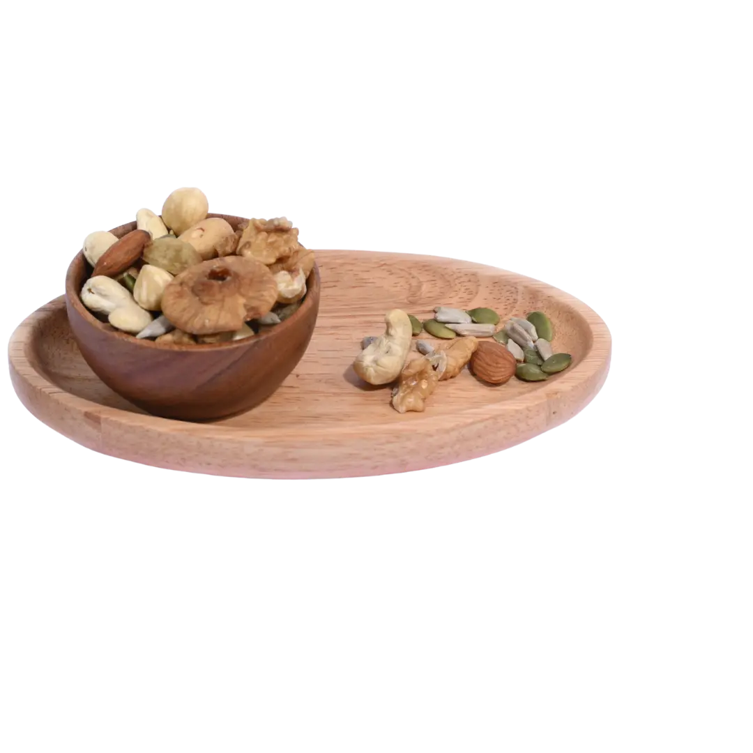 Wooden bowl and tray with mixed nuts Wholesome Nutty Trail Mix on a white background