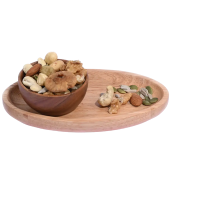 Wooden bowl and tray with mixed nuts Wholesome Nutty Trail Mix on a white background