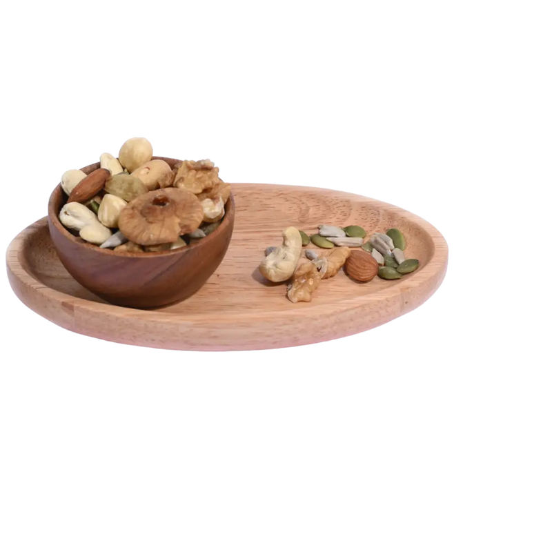 Wooden bowl and tray with mixed nuts Wholesome Nutty Trail Mix on a white background
