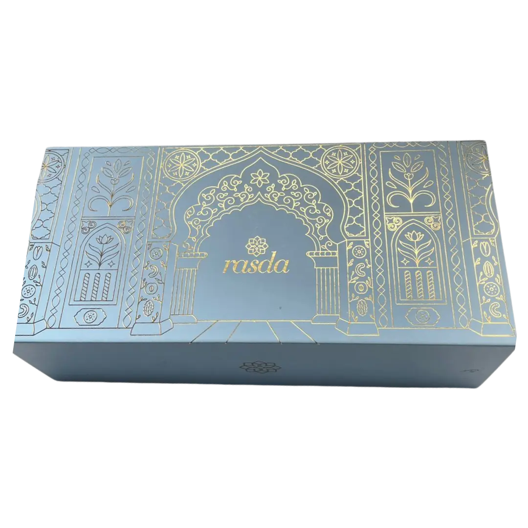 Rajastha Signature gift box closed, powder blue rigid box with a gold-foiled Mughal archway