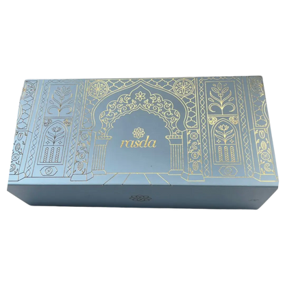 Rajastha Signature gift box closed, powder blue rigid box with a gold-foiled Mughal archway