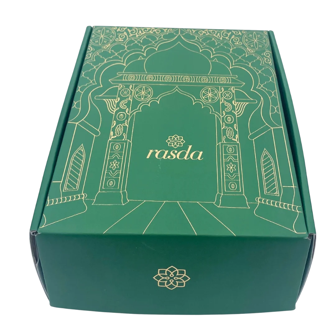 Ranvita Designer gift box closed, emerald green with gold Mughal archway line art and the rasda wordmark