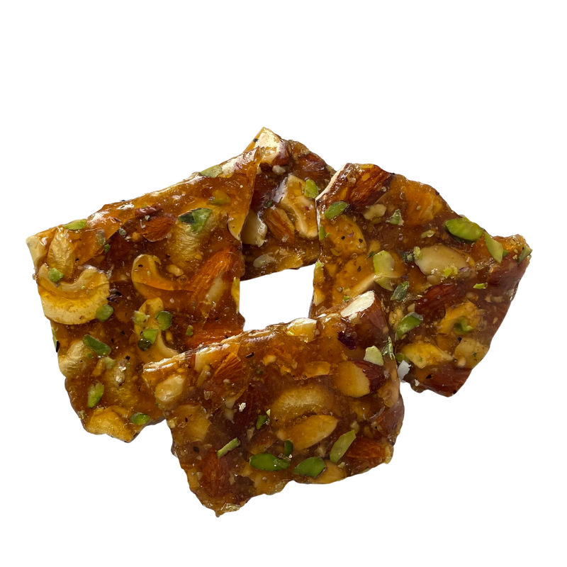 The superhero of the chikki world, Dry Fruit Chikki, is made with a powerful combination of cashews, pistachios, and almonds.